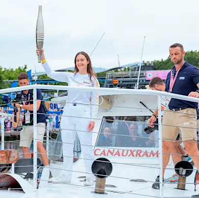 The Olympic flame on the Canauxrama boat